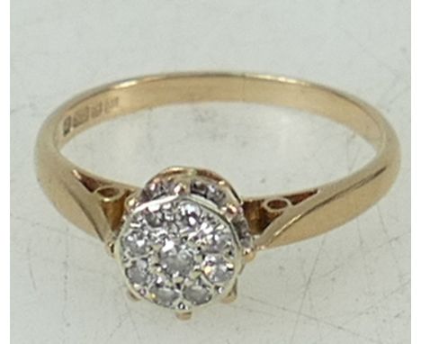 9ct gold ring: Ring set with centre cluster of diamonds, size K/L, 2 grams.