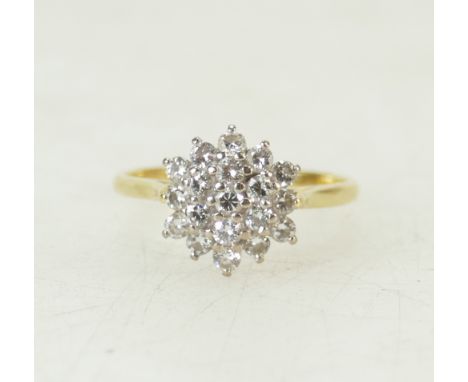 18ct gold Diamond cluster set ring: Ring set with 20 diamonds, size P/Q,3.9 grams.