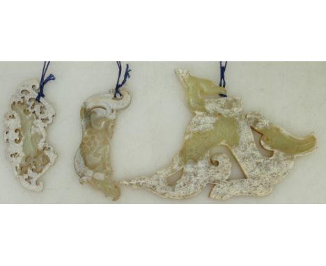 A group of Archaistic Jade plaques: Group comprising a partially calcified jade Chilong plaque,a partially calcified jade myt