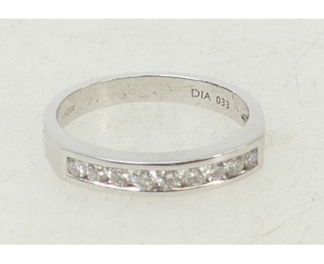 18ct white gold half Eternity Diamond ring: Ring set with diamonds approx .33ct, size N, 3.5grams.