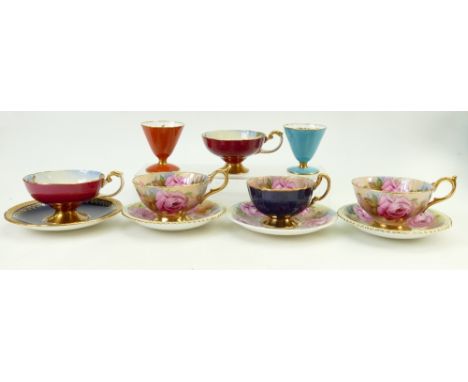A collection of Aynsley tea cups and saucers: Aynsley cups and saucers decorated inside &amp; out with roses, plus 2 cups pai