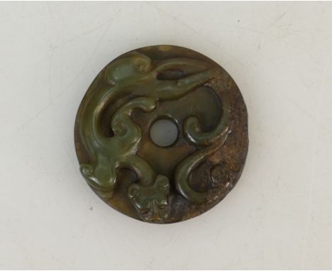 Chinese Jade round pendant carved with dragon: Pendant diameter 4.5cm, Provenance Collection of Richard Drew (1938-2017).