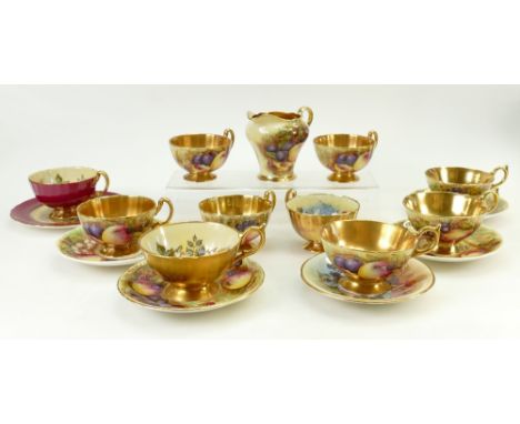 A collection of Aynsley gilded tea cups and saucers: Aynsley cups and saucers decorated with various roses by J A Bailey. (12