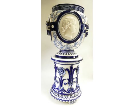 19th Century Minton jardiniere and stand: Jardiniere decorated with portrait panels and embossed floral decoration, overall h