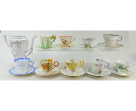 A collection of Shelley cups and saucers: Cups and saucers by Shelley in various designs. (18) (please note image of teapot i