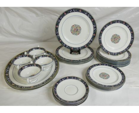 A large collection of Wedgwood dinner &amp; tea ware: Wedgwood ware in the Runnymede design, comprising large platters, two h