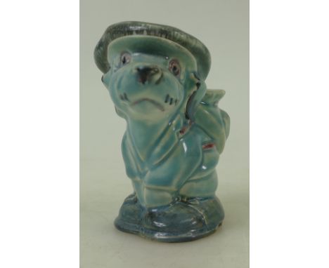 Beswick rare blue glazed model of a dog with cap and golf bag: Beswick blue glazed dog figure ref 624, height 10cm.