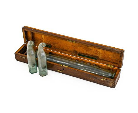 An Early 19th Century Stephenson Glass (Cucumber Glass), circa 1828-1830, 63cm long, cased; and A Pair of 1930's Glass Grape 