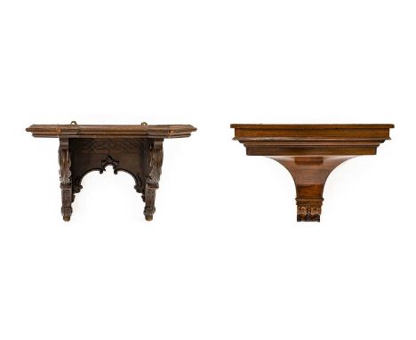 Two Mahogany Wall Clock Brackets, the first: a Victorian bracket with scroll and acanthus leaf carved decoration, 34cm high, 