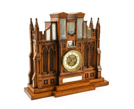 An Unusual Oak and Silver Mounted Church Organ Form Striking Mantel Clock, circa 1887, church organ form case with silver mou