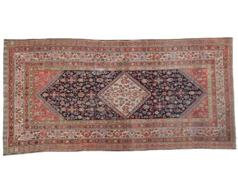 Malayir KhellehWest Iran, circa 1920The deep indigo lozenge shaped field of Herati design centred by an ivory diamond medalli