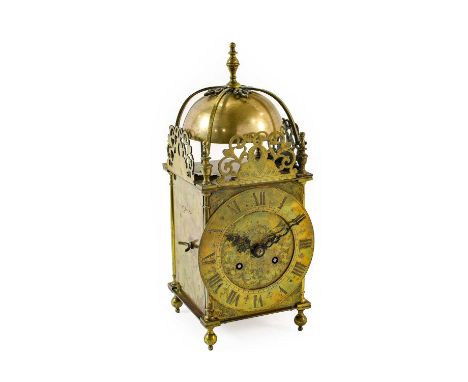 A Lantern Form Striking Mantel Clock, circa 1910, four posted frame case, pierced top frets, side doors inscribed "1st Jan 19