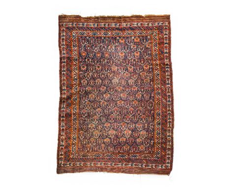 Afshar RugSouth East Iran, circa 1890The indigo field with a oneway boteh design enclosed by triple borders, 241cm by 148cmCo