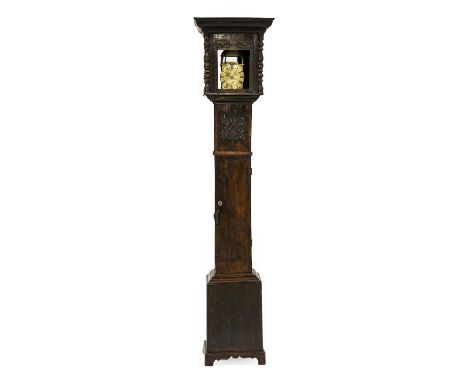 An Oak Cased Lantern Clock, the 17th century style oak case with a flat top pediment, hinged front door, side doors, front of