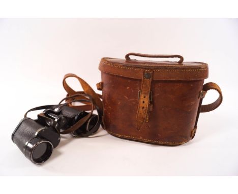 A pair of E. Leitz Wetzlar binoculars, Dienstglas 6 x 30, numbered 282187 H/6400, with a WWII English leather case