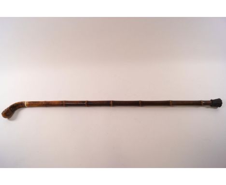 An early 20th century bamboo shafted sword stick