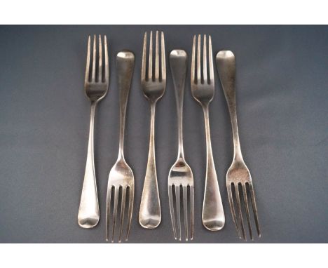 A set of five George III silver desert forks, by William Eaton, London 1803, each engraved with a monogram, and a matched sil