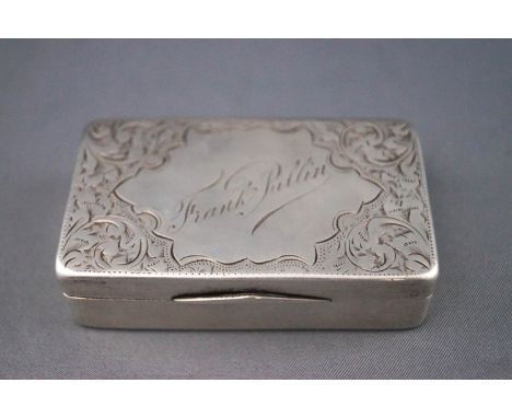 An early 20th century rectangular silver snuff box, engraved with scrolling foliage and flowers, the cartouche to the top eng