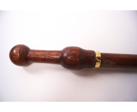 An early 20th century wooden shafted sword stick with screw top