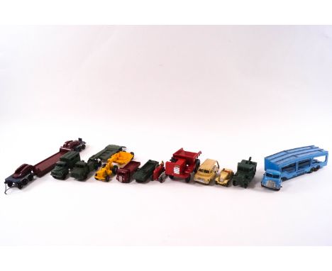 A collection of Matchbox 1950s & 60s die-cast vehicles, including London buses, tractors, tanks, cars, trucks, heavy machiner