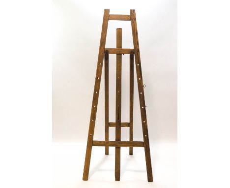 A large artists' easel, 180cm high x 64cm wide