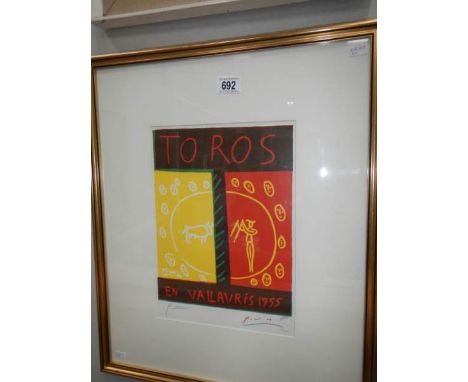 A framed and glazed 1957 lithograph poster print by Pablo Picasso entitled 'Toros', signed in pencil by Picasso (stamped Magd