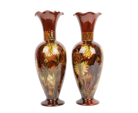 A Pair of Linthorpe Pottery Vases, shape 2219, decorated by Clara Pringle with daisies in a mustard glaze, impressed factory 