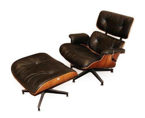 Charles and Ray Eames: A Brazilian Rosewood Lounge Chair and Ottoman, 1970s, the black leather padded upholstered covers, on 