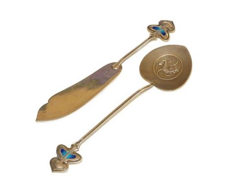 An Art &amp; Crafts Silver and Enamel Preserve Spoon and Butter Knife, by G.W.Harvey &amp; Co., both with stylised enamel fin