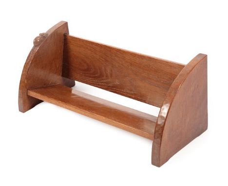 Workshop of Robert Mouseman Thompson (Kilburn): An English Oak Book Trough, with carved mouse trademark, 49.5cm wide .Grain s