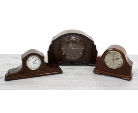 Three vintage wooden cased mantel clocks including an inlaid 8 days example, largest 14" wide, 9.5" high (3)