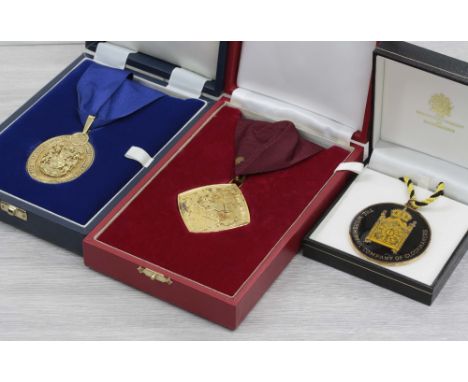 Three silver gilt presentation medallions; 'Past Chairman The Giftware Association' 1.8oz t, 'British Jewellery &amp; Giftwar