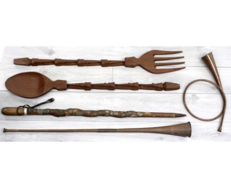 Large African novelty carved wooden spoon and fork, each with elephant head decoration to the handles 37" long; together with