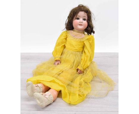 Schoenau &amp; Hoffmeister SPBH 914, 11, German bisque headed doll, with brunette hair and fixed eyes, stamped marks no. 914 