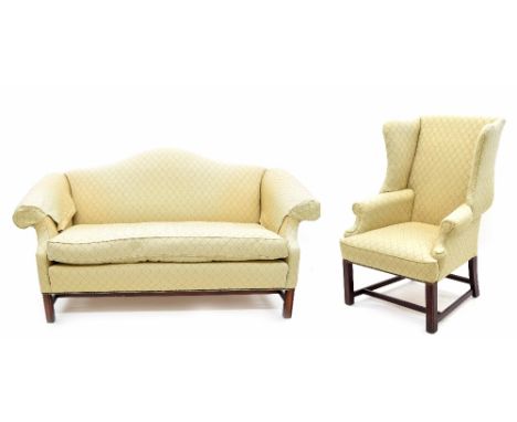 Georgian style upholstered settee and matching wing armchair by Dodge &amp; Son, with Fleur de Lys pattern upholstery upon sq