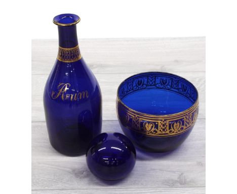 Bristol Blue glass decanter, with gilt decorated collar band titled 'Rum', lacking stopper, 8.5" high; together with a blue d