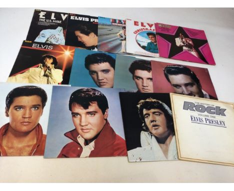 A box of LP records including Elvis, Bob Dylan, The Moody Blues See photos for titles 