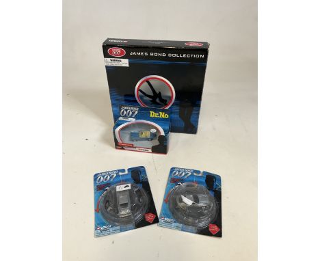 Corgi collection of James Bond cars in film canister, boxed, also with a Corgi James Bond Dr No car, and 2 other cars