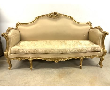 A large french style gilt sofa. W:218cm x D:90cm x H:120cm
