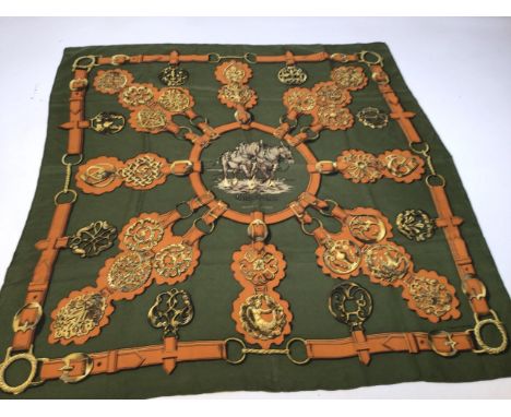 A vintage Hermes scarf Cuivreries by F de La Perriere in olive green colour way. Featuring shire horses and brasses