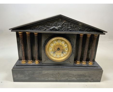 A slate mantle clock W:44cm x D:13cm x H:33cm