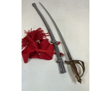 A reproduction sword and scabbard marked â€œIndiaâ€.  Length:104cm