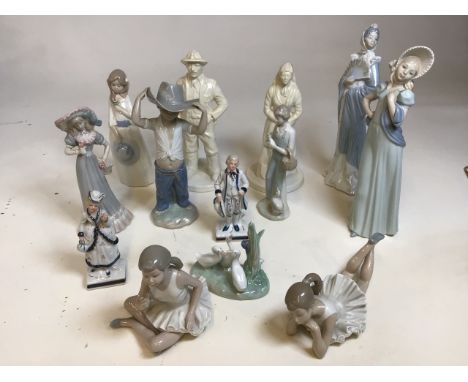 A quantity of ceramic figurines including Nao ballerinas, geese and a boy 