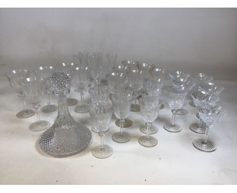 A quantity of Galway Irish Crystal including a decanter and glasses. Includes, flutes, coupes, three sizes of wine glasses. 