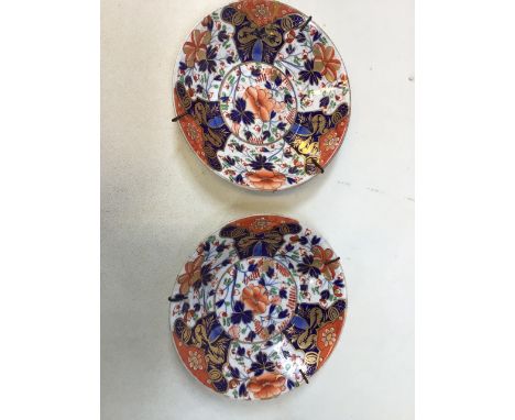 Royal Crown Derby nineteenth century Imari saucers - repairs and hairlines to both.