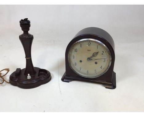 A Smiths Bakelite mantle clock also with a Bakelite lamp 