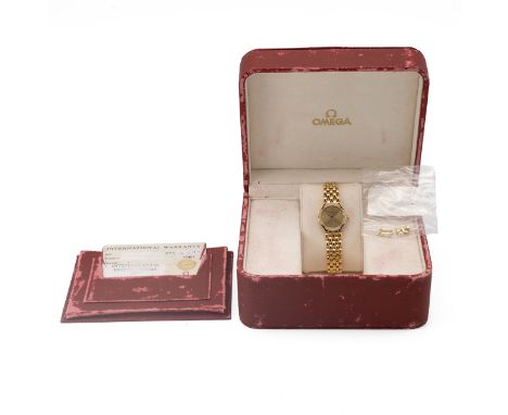 Lady's Omega De Ville Vasarely 18ct &amp; Diamond wristwatch, c1987. 18ct yellow gold 23mm case, brushed gold face with diamo