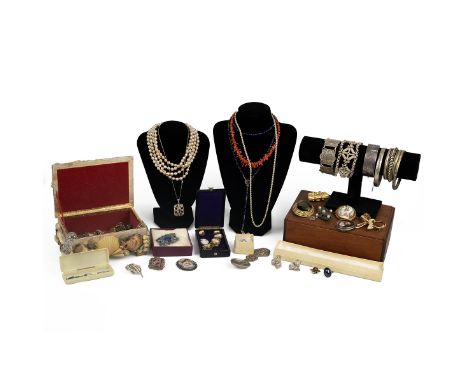 Collection of costume jewellery including silver bangle, coral necklace, cameo bracelet and various other items.