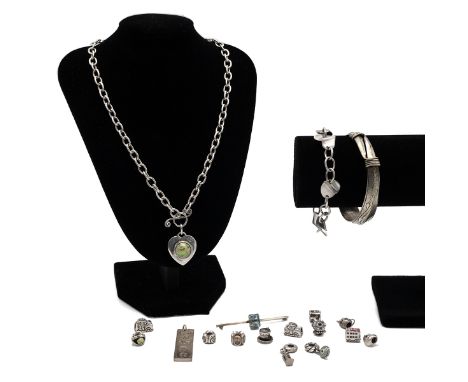 Collection of thirteen Pandora-style charms; a silver ingot pendant; a pendant on a chain; a bracelet; a bar brooch; and a ba