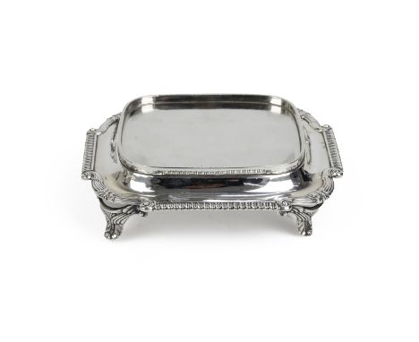 George III silver teapot stand, with a reeded and gadrooned border, raised on four outstretched feet, London 1809, R &amp; S 